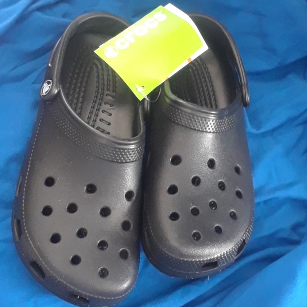 New pair of Crocs.  Size men's 8 or women's 10.